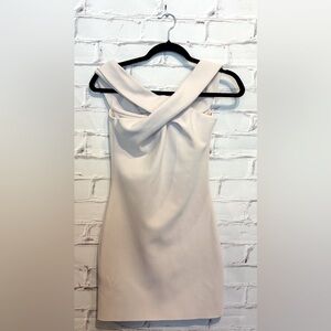 Bec + Bridge Light Pink Cross Front Mini Dress
Size 4